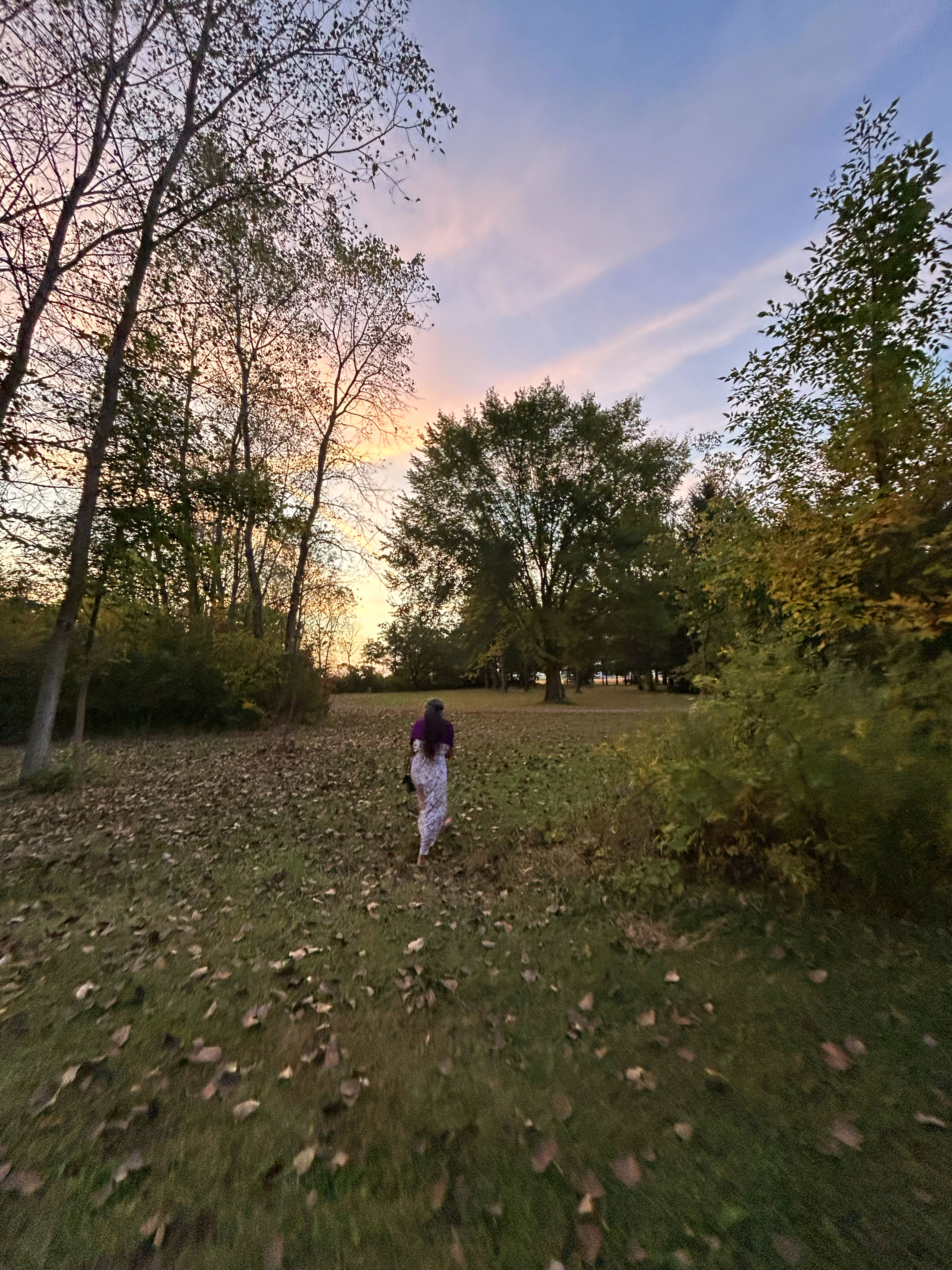 Panoka walking beneath the evening sky at Otter Creek